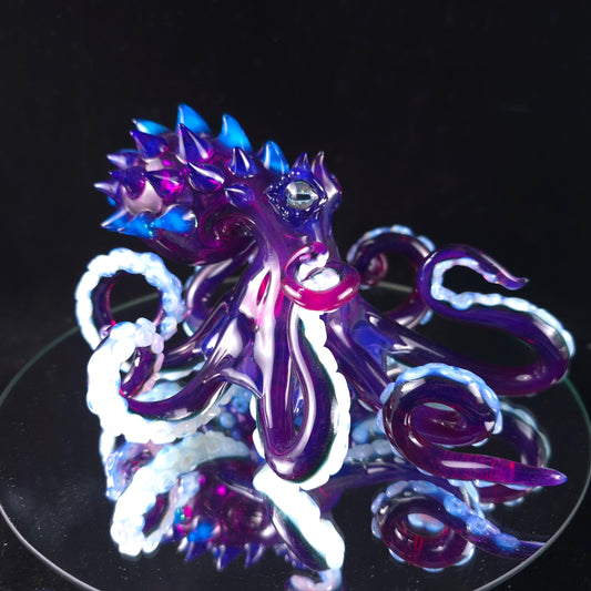 Gold purple octopus sculpture