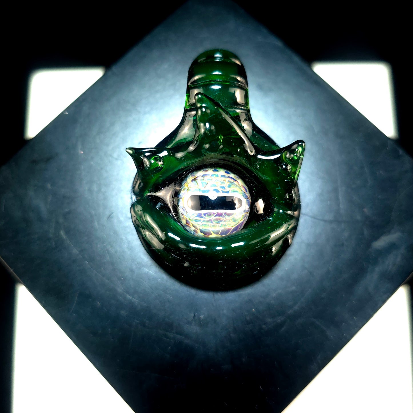 Plantfibian octopus eye pendant