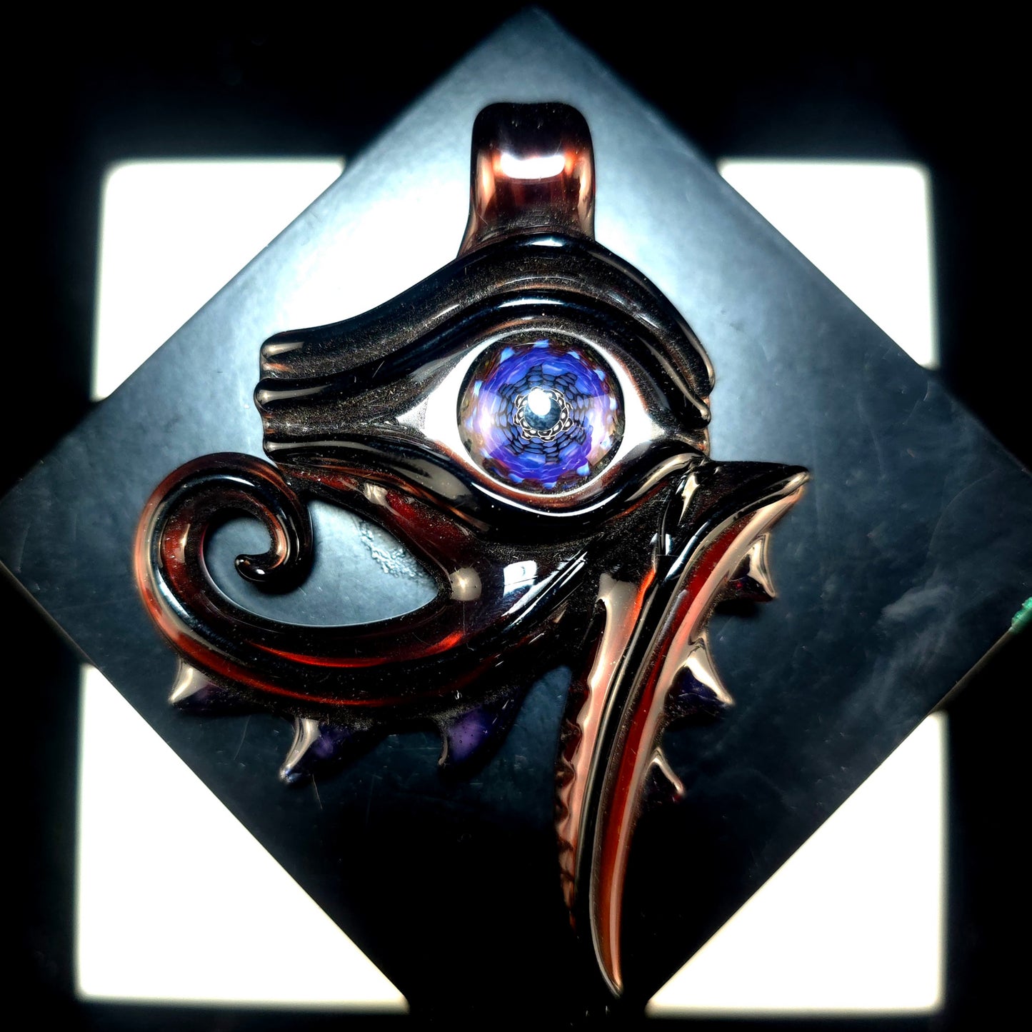 Candy apple red eye of Ra pendant
