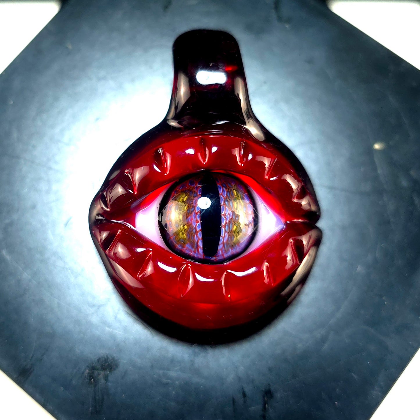 Karma dragons eye pendant