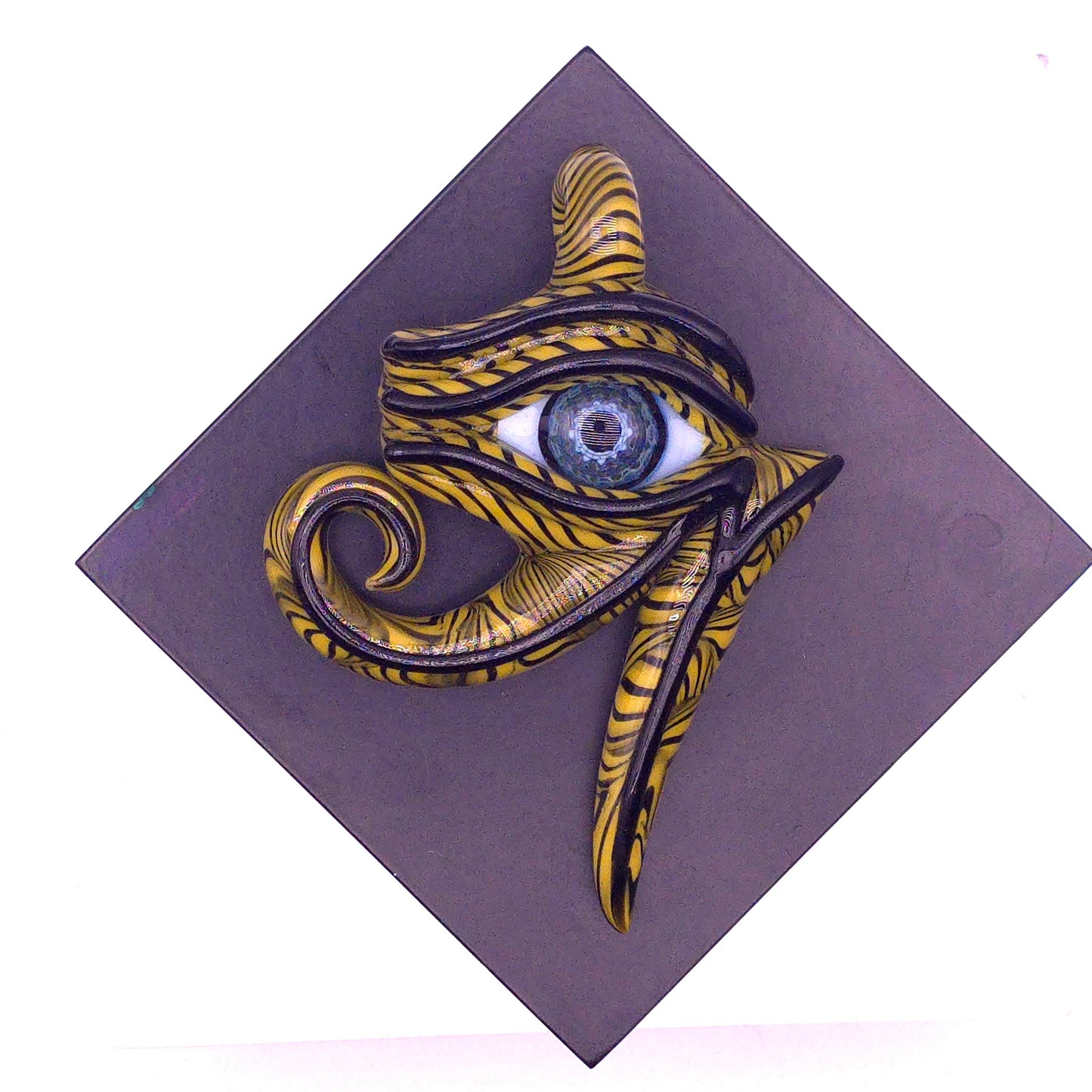 Canary cane eye of Ra pendant