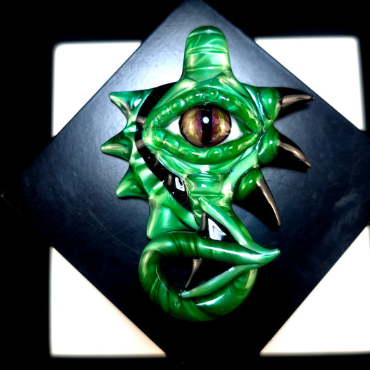 Chromium dragon pendant