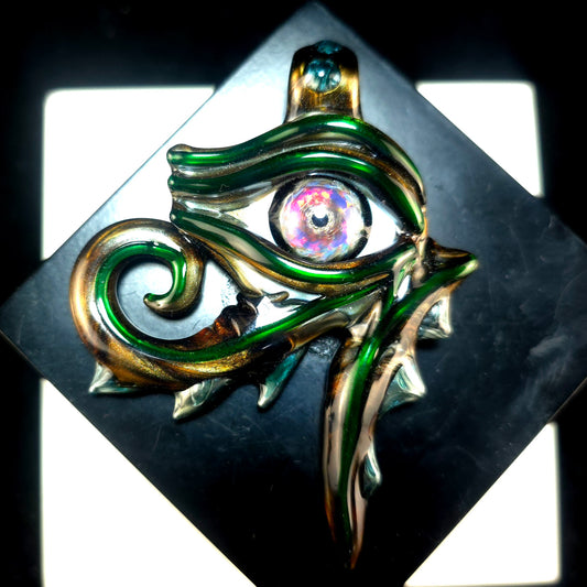 Electrum eye of Ra pendant