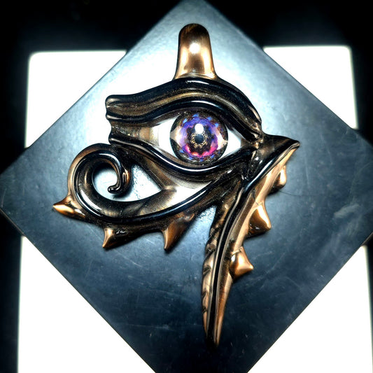 Electrum eye of Ra pendant