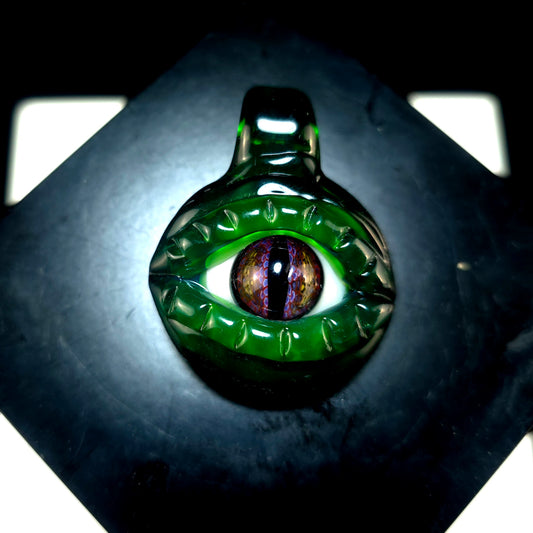 Plantfibian dragons eye pendant