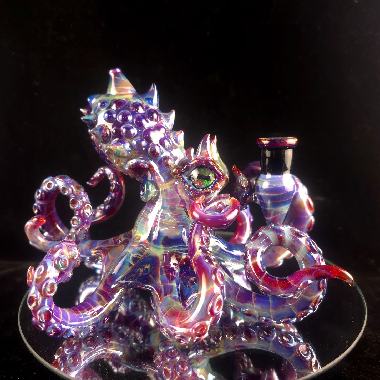 Amber purple octopus with opal eyes!