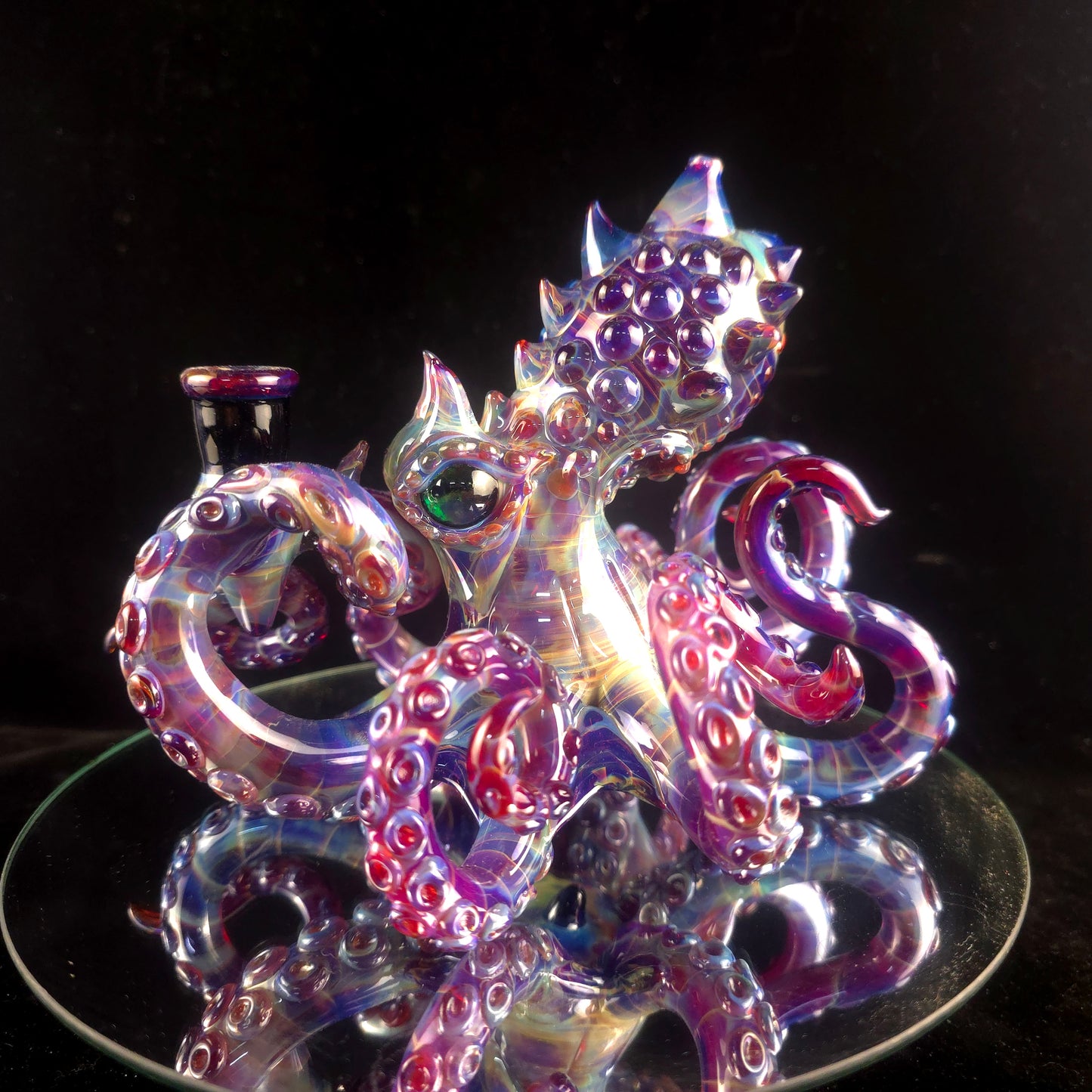 Amber purple octopus with opal eyes!