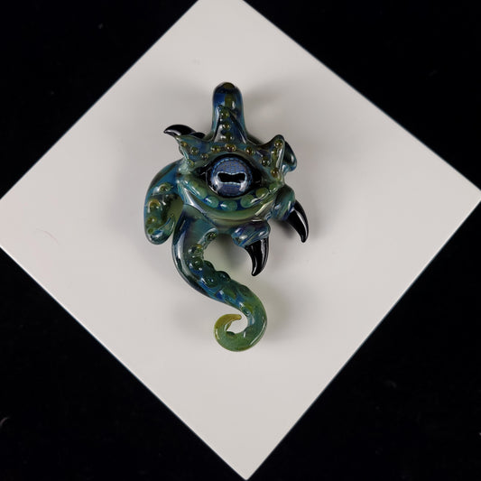 Sculpted octopus eye pendant