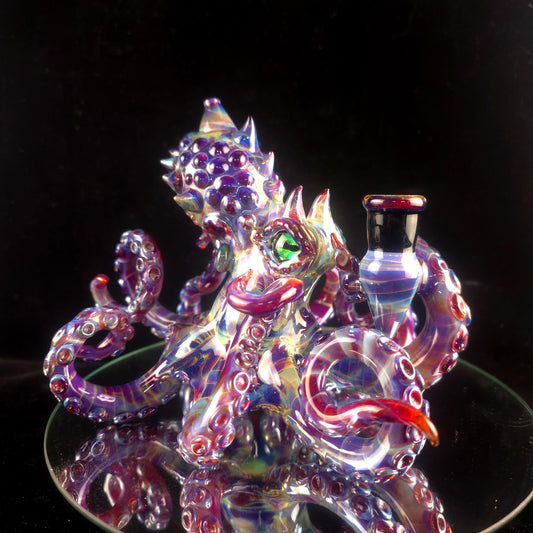 Amber purple octopus with opal eyes!